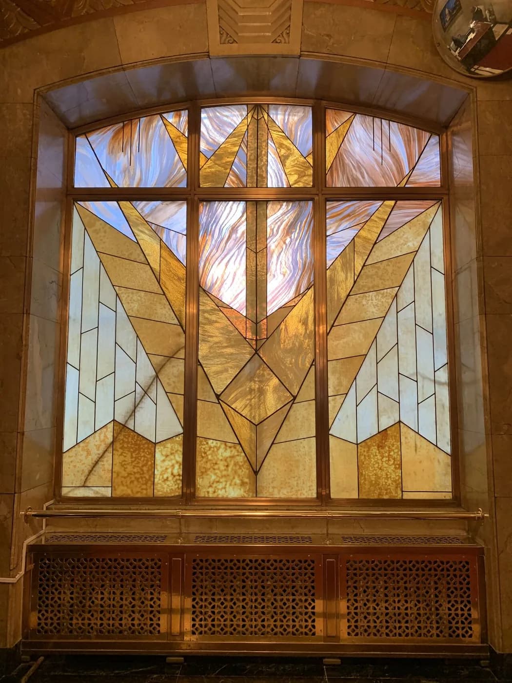 Art Deco stained glass window designed for the Aldred Building entrance hall